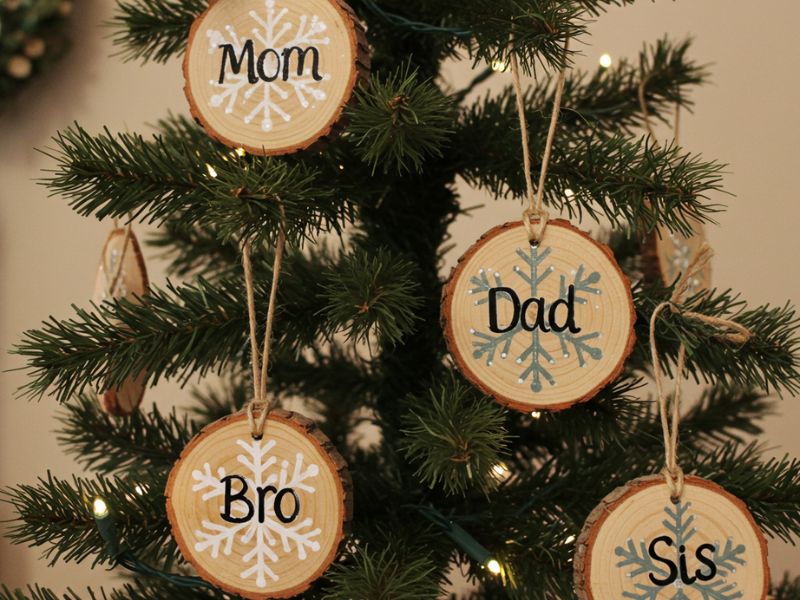 christmas ornament: rustic wood slice ornaments labeled with family member names, ideal for unique christmas tree decor